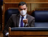 The President of the Government, Pedro Sánchez, attends the plenary session of the Congress of Deputies that debates and votes this Thursday the validation of the labor reform.